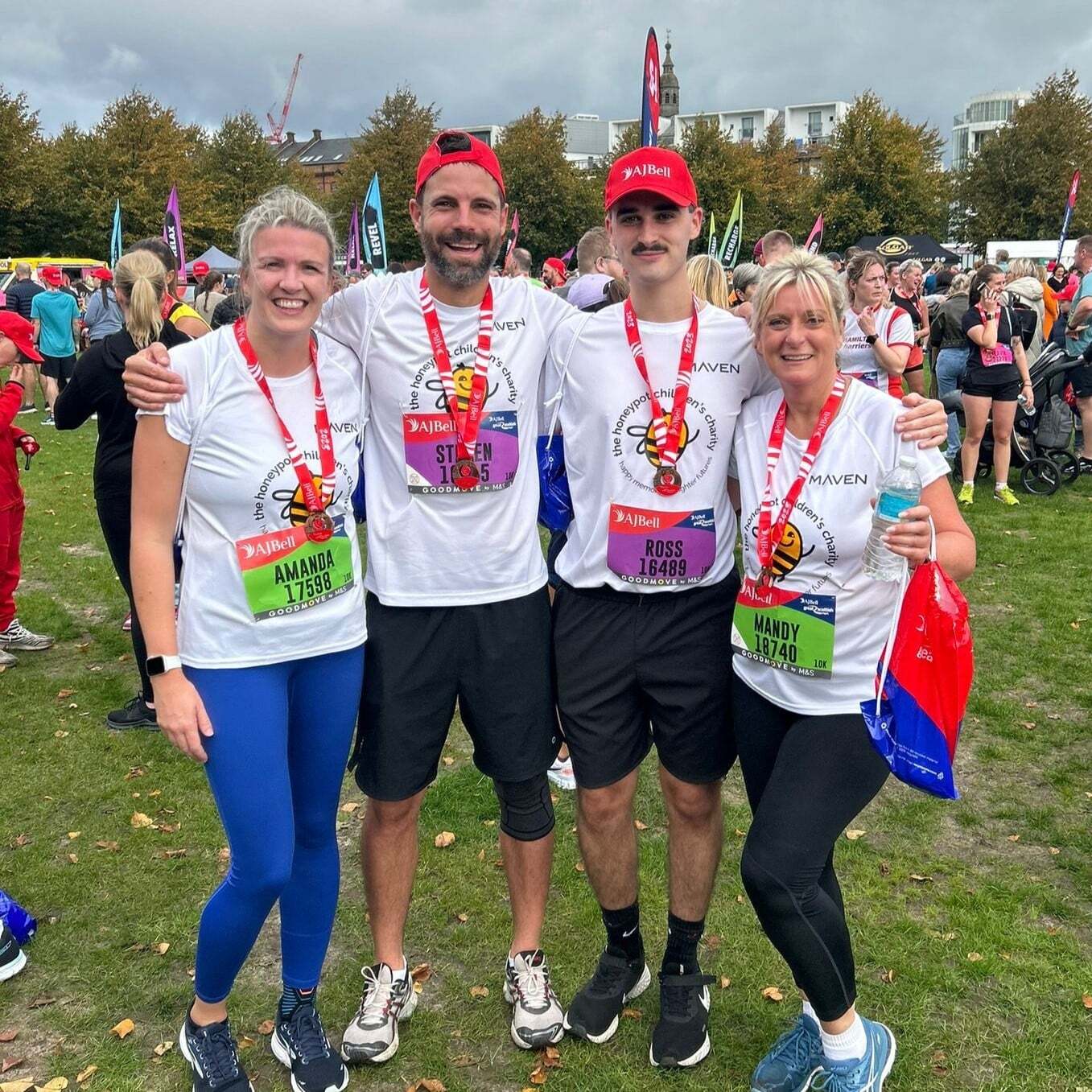 Maven's Great Scottish Run 10k runners pictured with medals