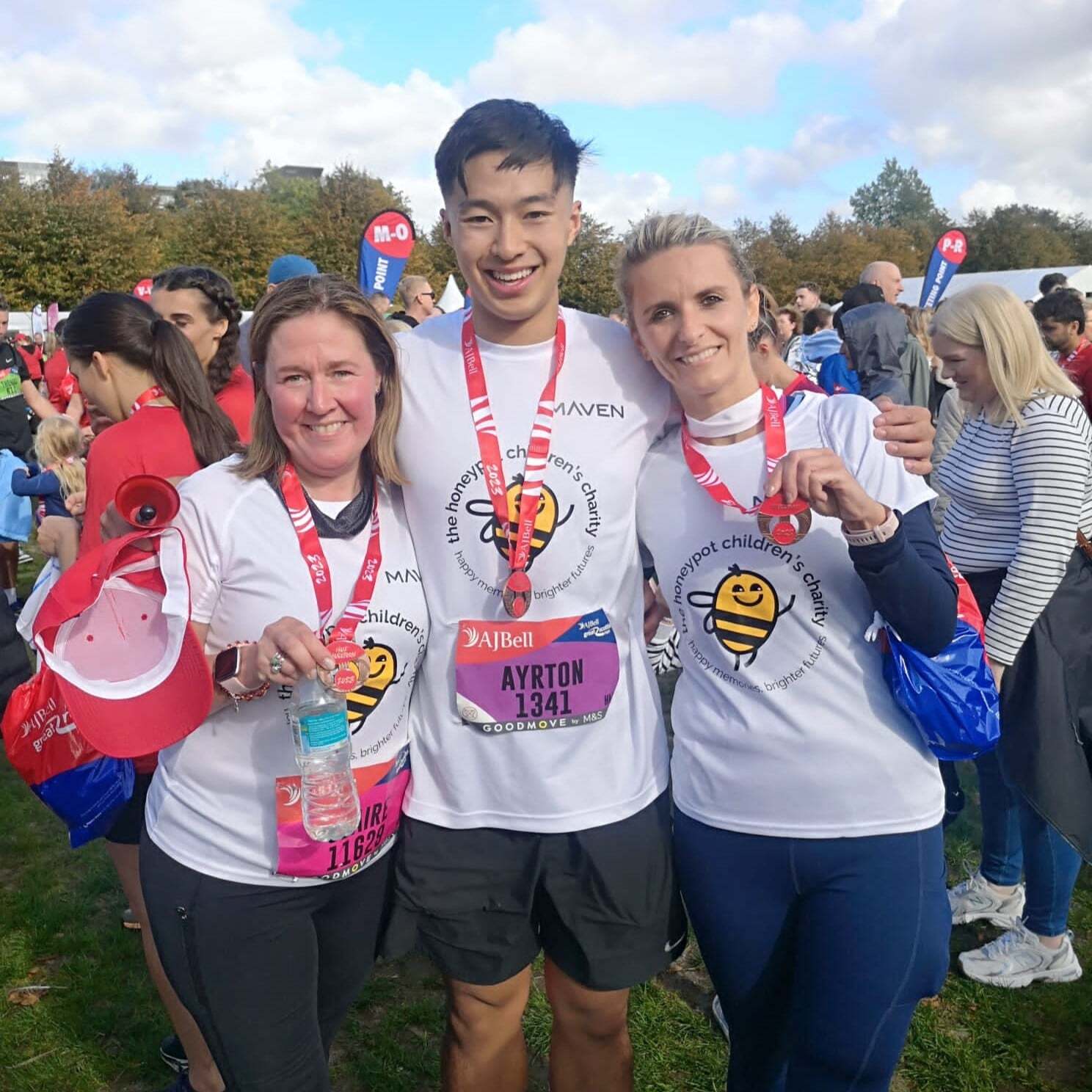 Maven's Great Scottish Run half marathon runners pictured with medals