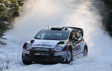 racing car with DMACK branding