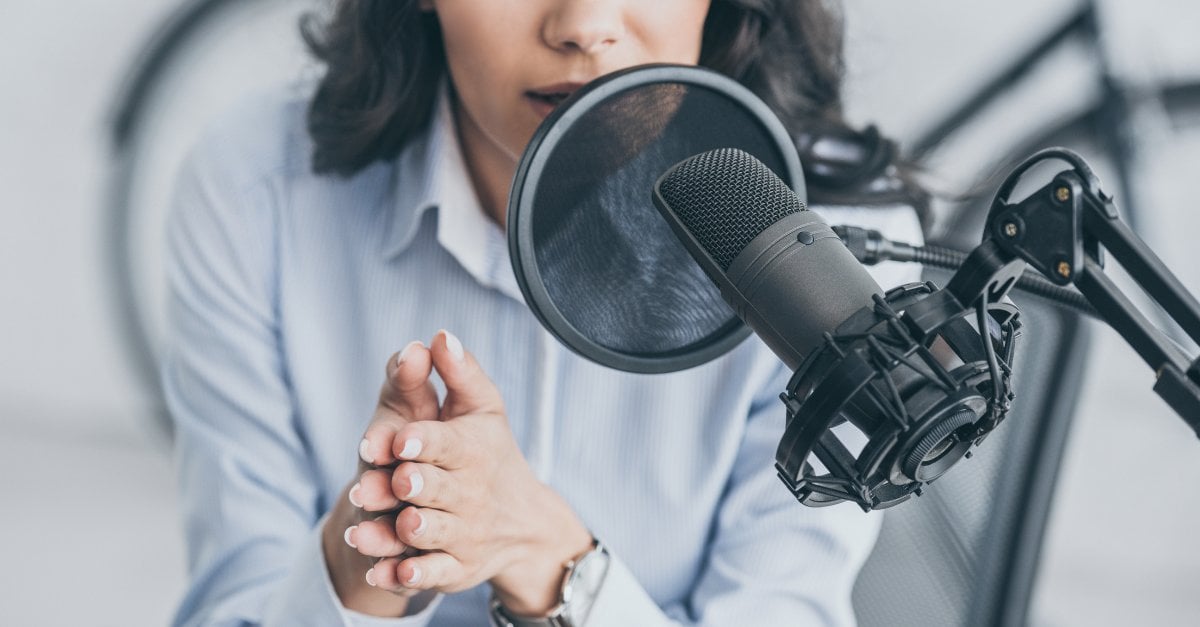 business woman hosting a podcast
